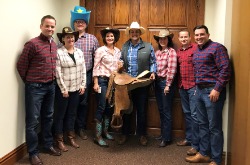 Bank employees dressed up as cowboys